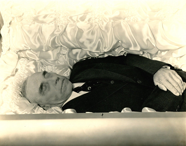dead man body in coffin casket