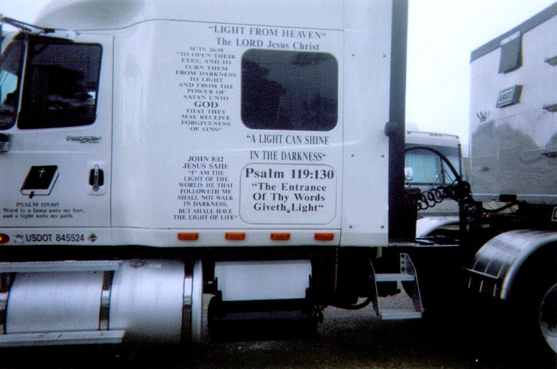 Evangelistic truck driver tractor cab with Bible verses