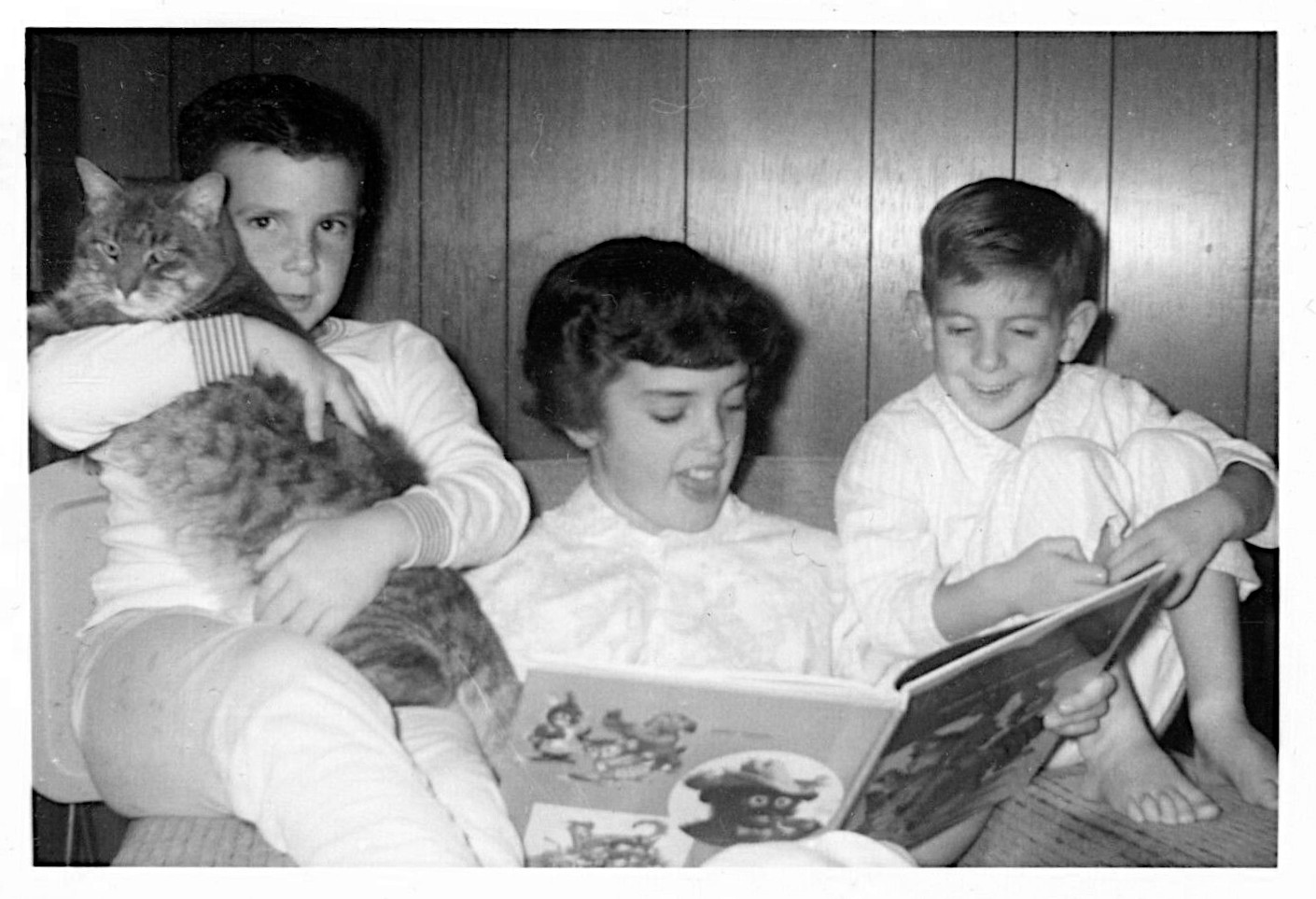 mother home schooling reading books to children